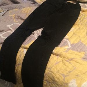 Ripped black skinny jeans